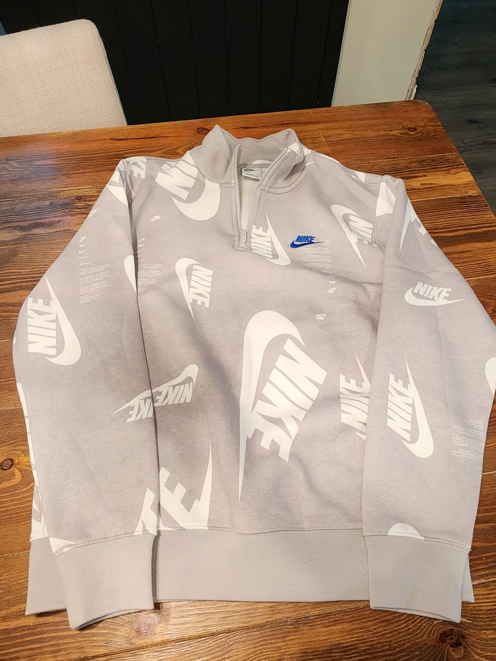 Nike Light Grey All-Over Logo Quarter-Zip Pullover with Blue Accent